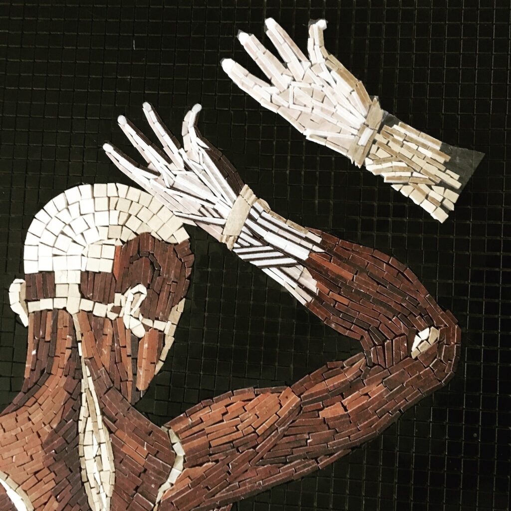 Two hands and an arm in loose stone on Table 31, one of them a replacement for an earlier version